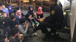 Officer Saleh Reads to Our Third Grader